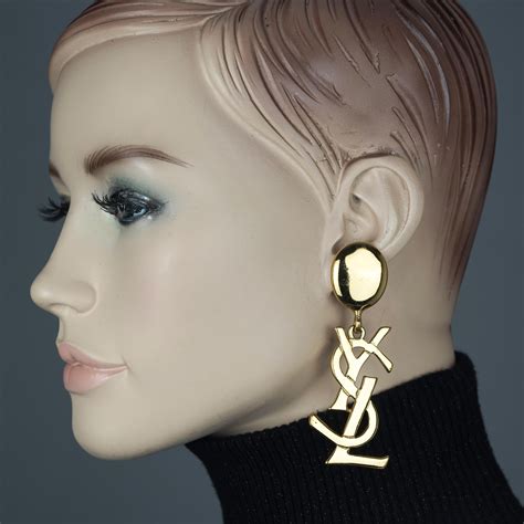 ysl earrings samantha jones|Yves Saint Laurent Oversized Logo Earrings .